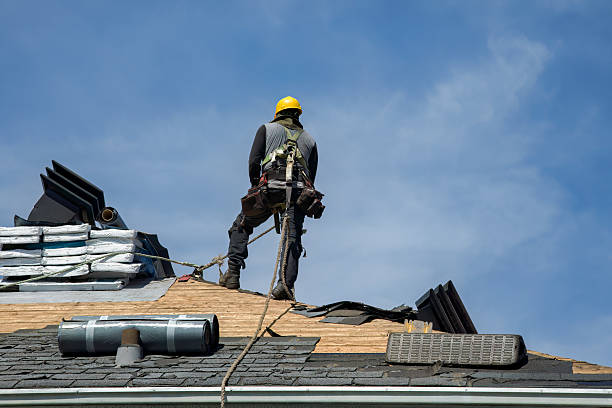 Professional Roof Replacement technician working in Delhi, CA